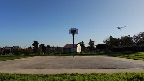 empty basketball court on public park due pandemic