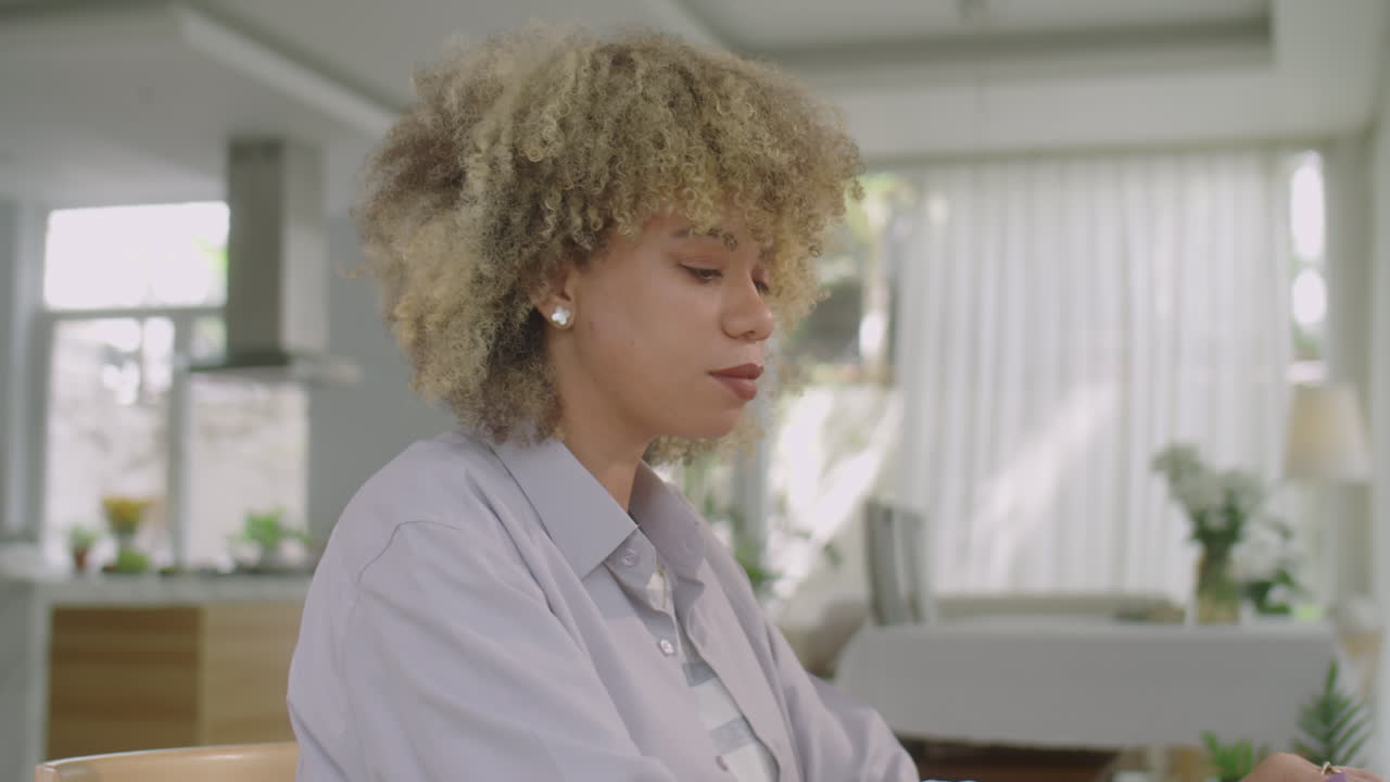 Latin Girl Working Online on Laptop at Home