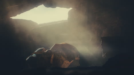 a head of the giant ancient deity statue hidden in a cave
