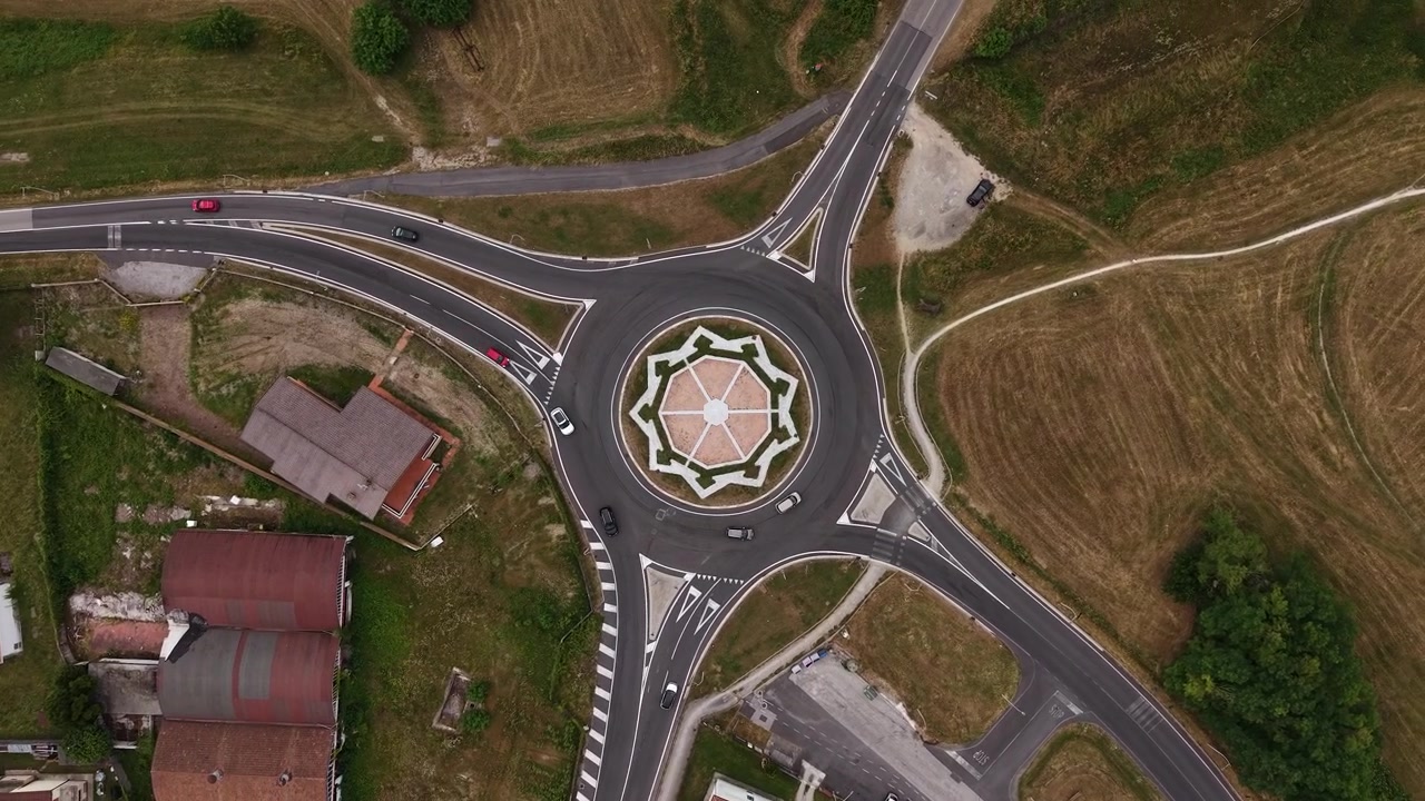 Roundabout Traffic, Top Down Drone View, Roads and Circle With Star, High Angle Aerial