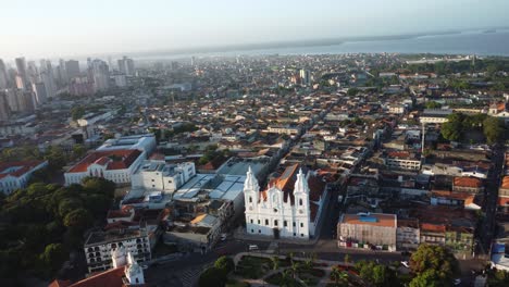 belem city religious landmarks, urban sunrises, aerial reveal view