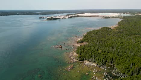 aerial view of quarry and wilderness coastline, les cheneaux islands, michigan