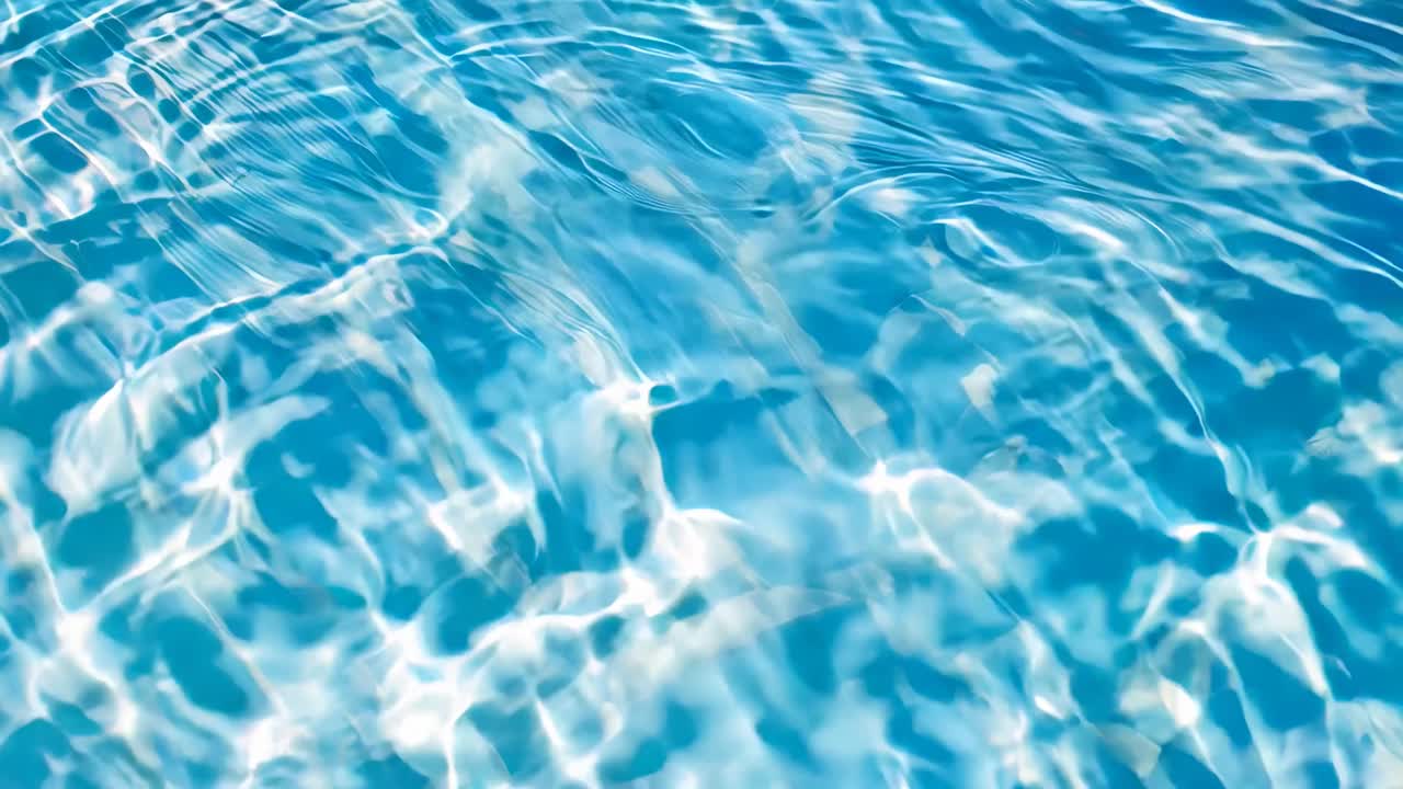 Aerial view of shimmering water surface with ripples, capturing a tranquil and abstract style