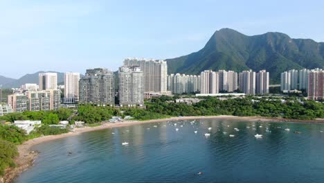 Aerial-view-of-Hong-Kong-Wu-Kai-Sha-area-with-modern-residential-building-complex-and-Tolo-Harbour-open-bay