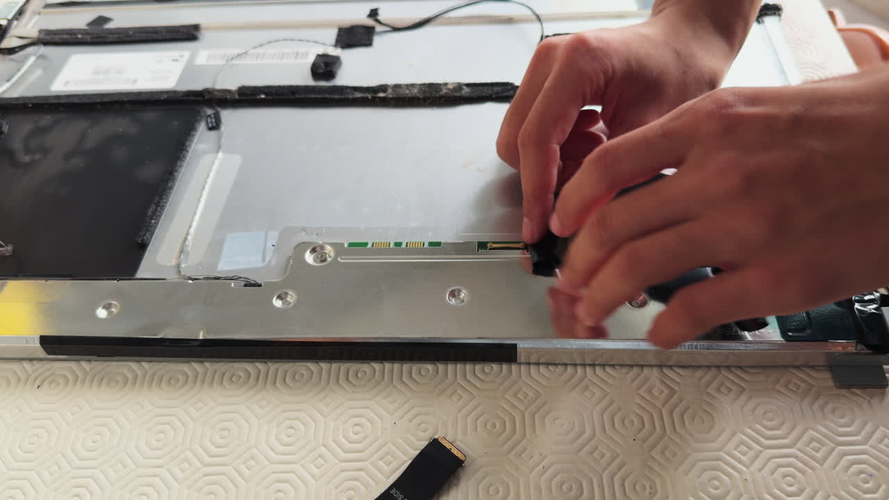 Man self repairing a computer