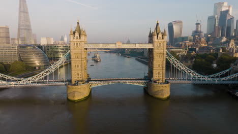tower bridge, london skyline at sunrise
