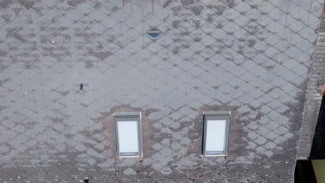 Overhead-View-Of-An-Eternit-Roof-Tile-Of-A-House-With-Brick-Chimney