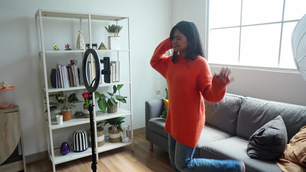 Asian Woman Content Creator Recording Video Dancing Challenge For Social Media App Network Using Mobile Phone