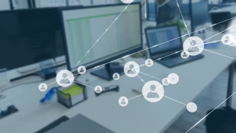 network of connections and data processing animation over office workspace