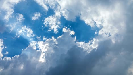 time lapse of clouds over blue sky