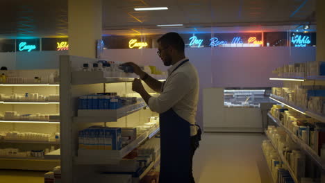 pharmacist stocking shelves in a modern pharmacy