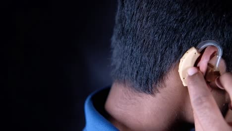 person wearing a hearing aid