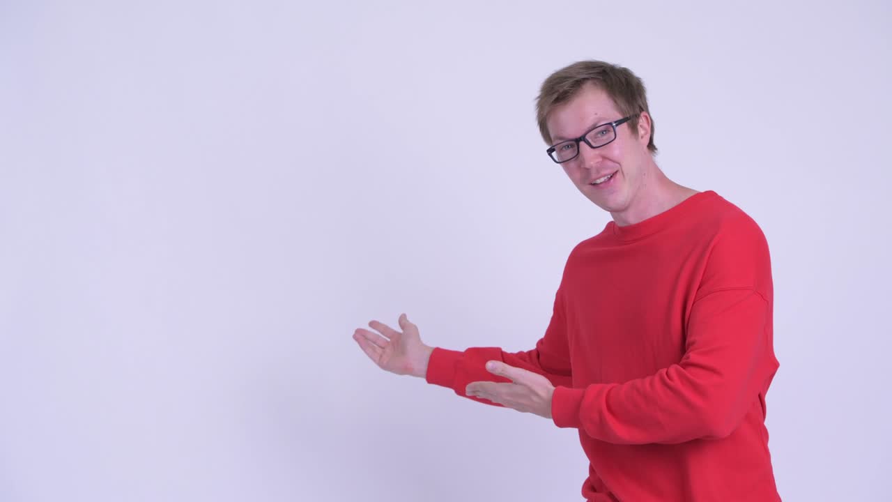 Studio shot of young handsome man