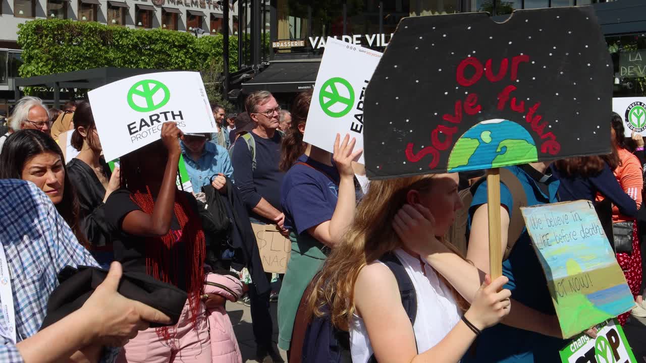 Activists With Placards At Protest Rally For Climate Action In Stockholm, Sweden. Close-up Shot