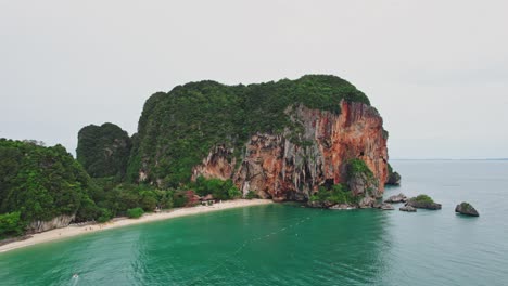 Aerial-Drone-View-of-Phra-Nang-Beach-in-Thailand-with-Limestone-Cliffs