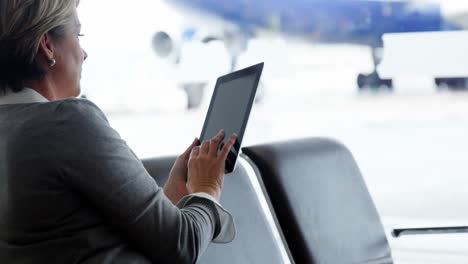 businesswoman using a digital tablet