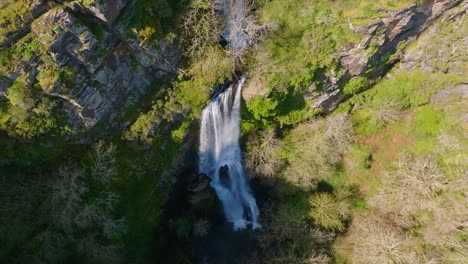 above view of vilagocende waterfall in the scenic fonsagrada in lugo province, spain