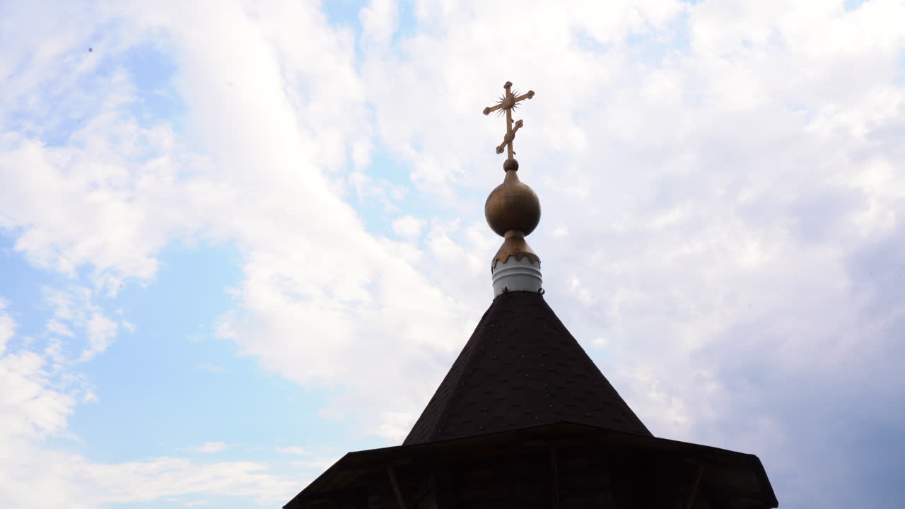 Close-up view of a church steeple and wooden roof