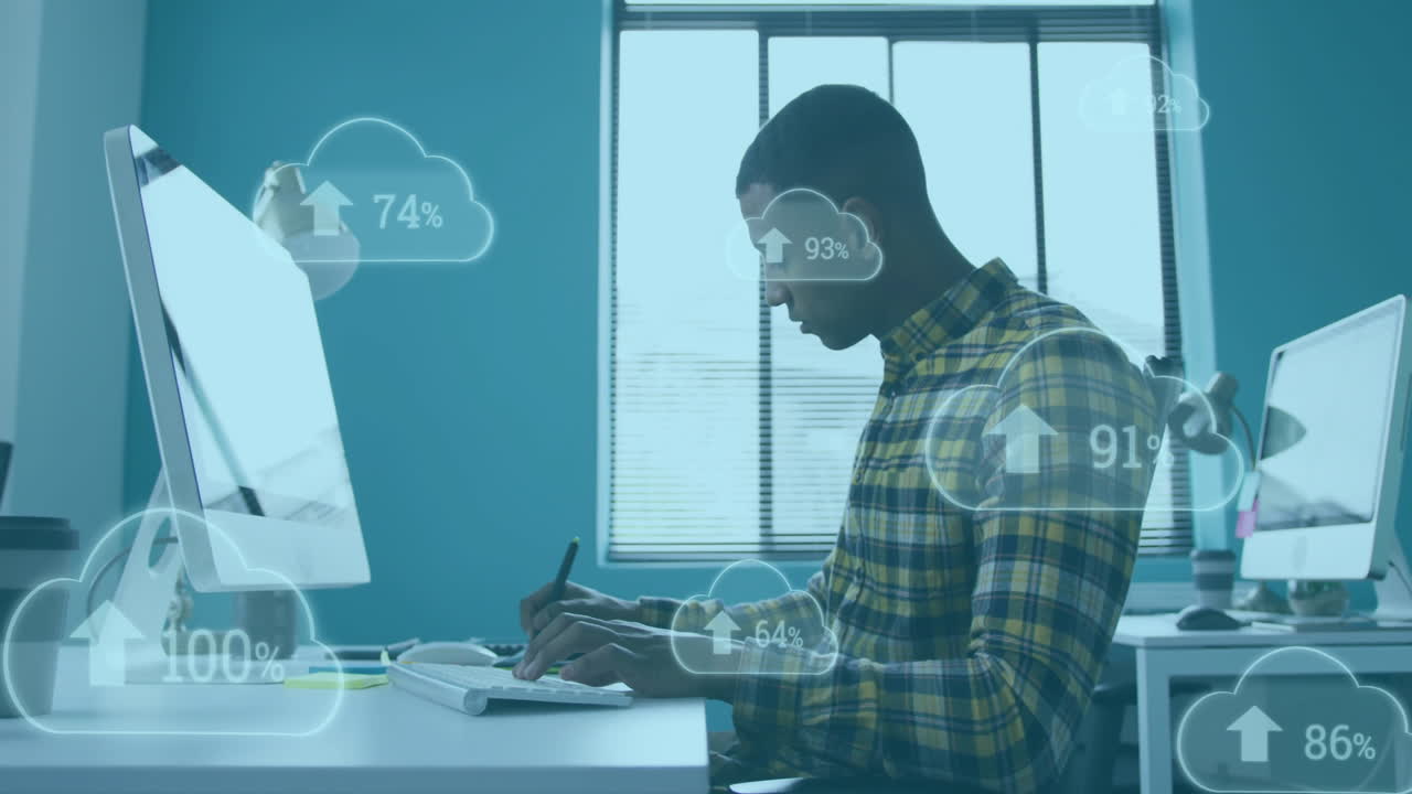 Animation of clouds with percent growing over african american businessman in office