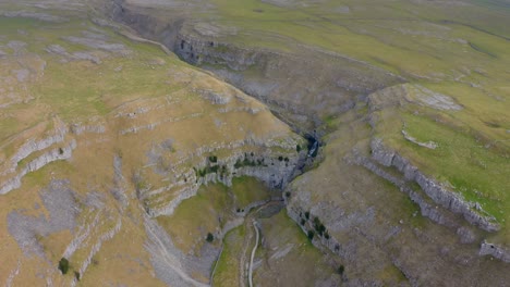 aeriel footage gordale scar is a limestone ravine near malham, north yorkshire, england
