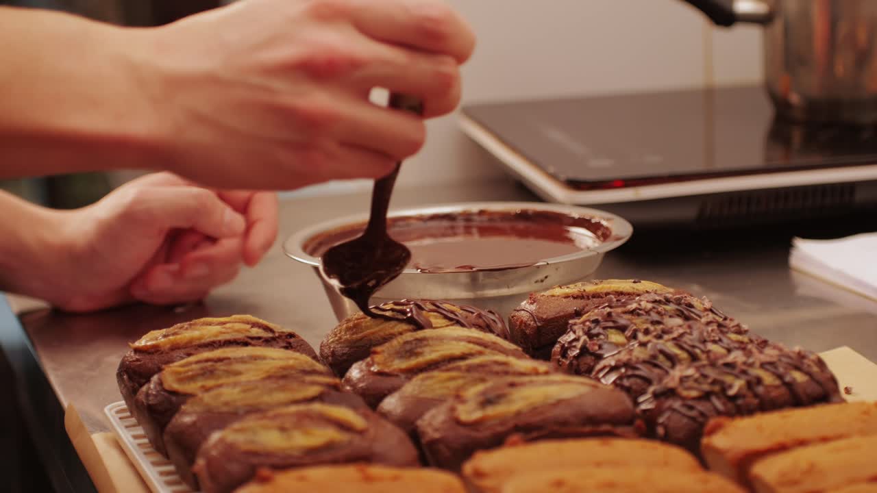 Fresh bake double chocolate banana artesian bread in bakery shop close-up. Artisan bread is making by skill bakers using natural and high-quality ingredients. Food with health and flavour benefits. Sweet breads for dessert and breakfast
