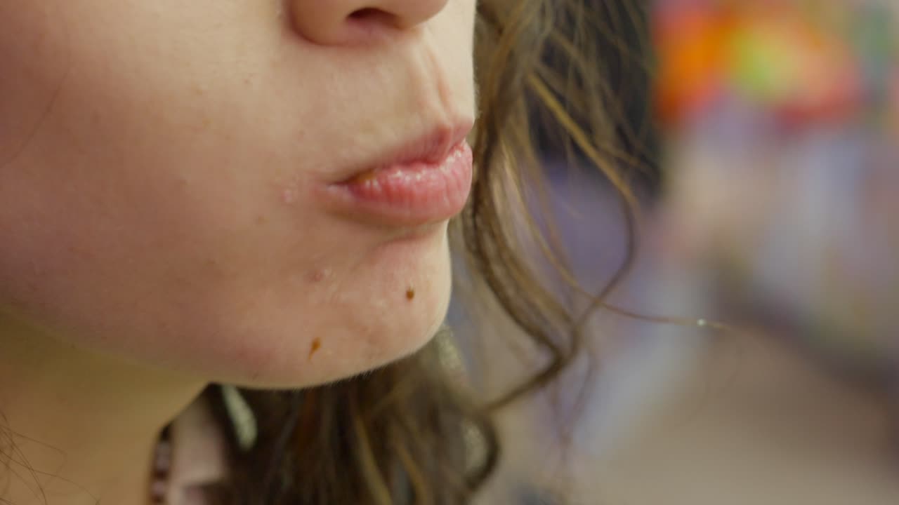 Woman Eating a Chocolate Waffle