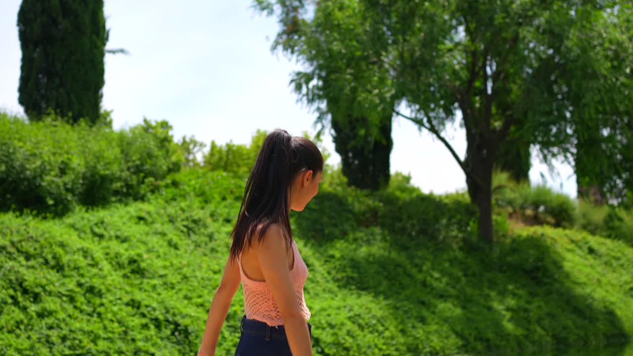 Woman dancing in a park