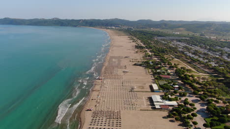 Albanian-Riviera-Beaches:-aerial-view-traveling-in-over-one-of-the-fantastic-beaches-of-the-Albanian-Riviera-on-a-sunny-day