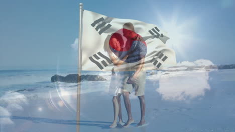 walking on beach, couple holding south korean flag in bright sunlight animation