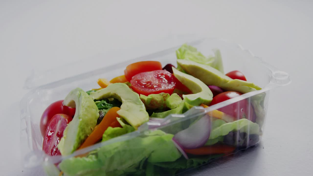 On play, clamshell salad remaining stationary while HUD overlays sliding in to show product data