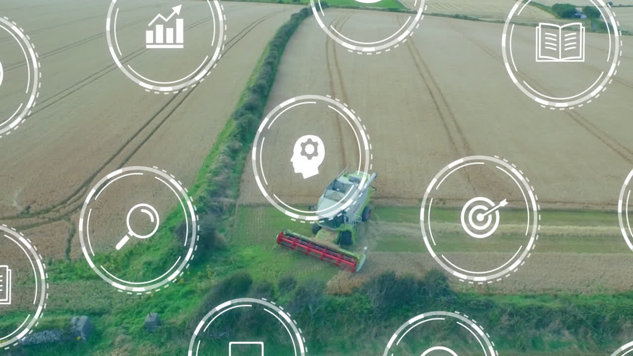Animation of agricultural technology icons overlaying combine harvester in field