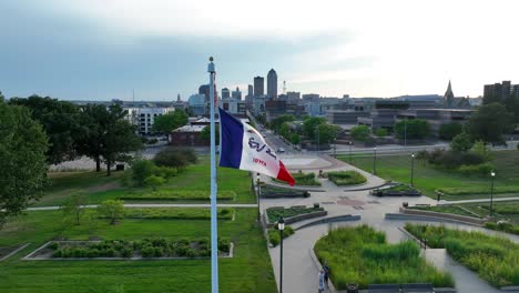 iowa state flag waving on capitol campus in des moines, ia