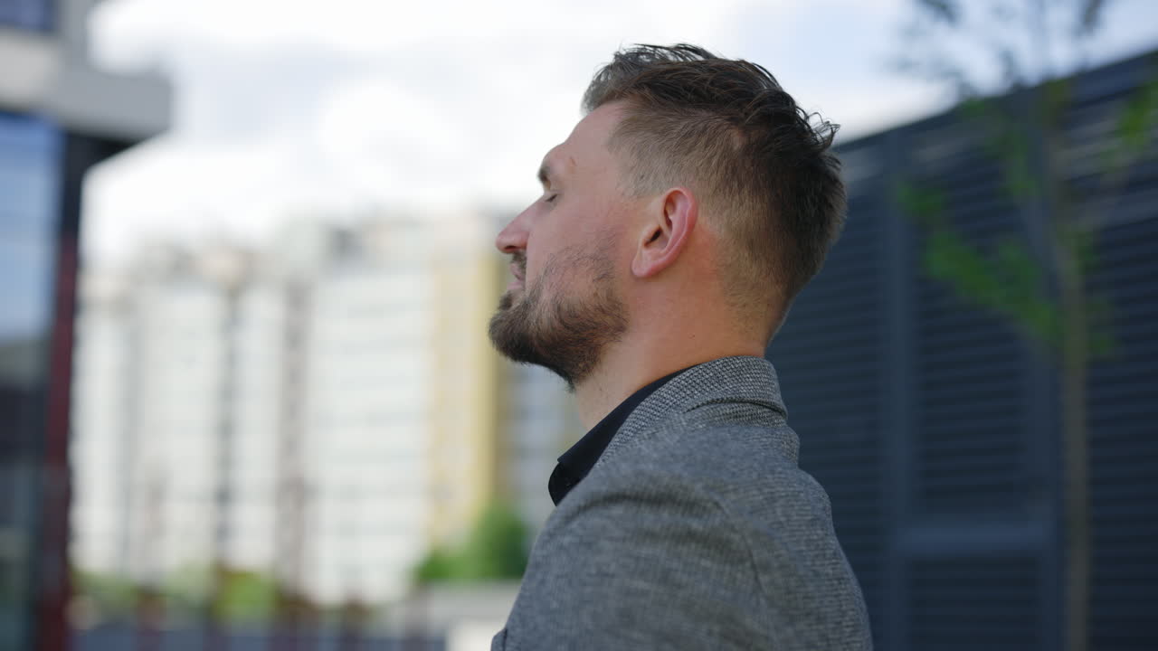 Man in city profile view