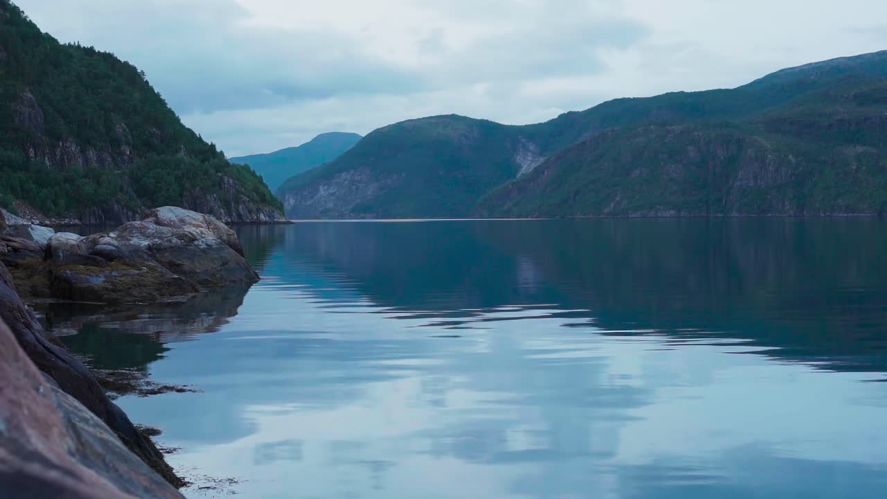 Mountain Mirror Reflections Over Leirfjord Near Kvitneset Campground In S&oslash;rfold, Norway