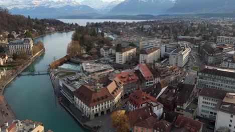 thun city in switzerland with river and canals and alpine landscape