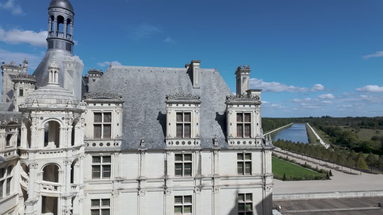 Chambord Chateau exterior with lake, stunning Loire Valley view