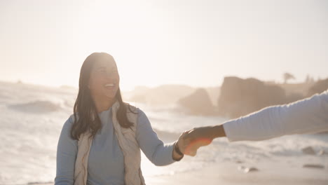 couple, dancing and sunset at a beach for fun