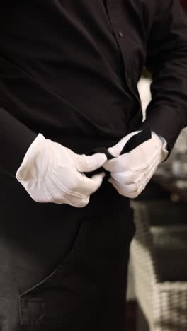 waiter preparing for service