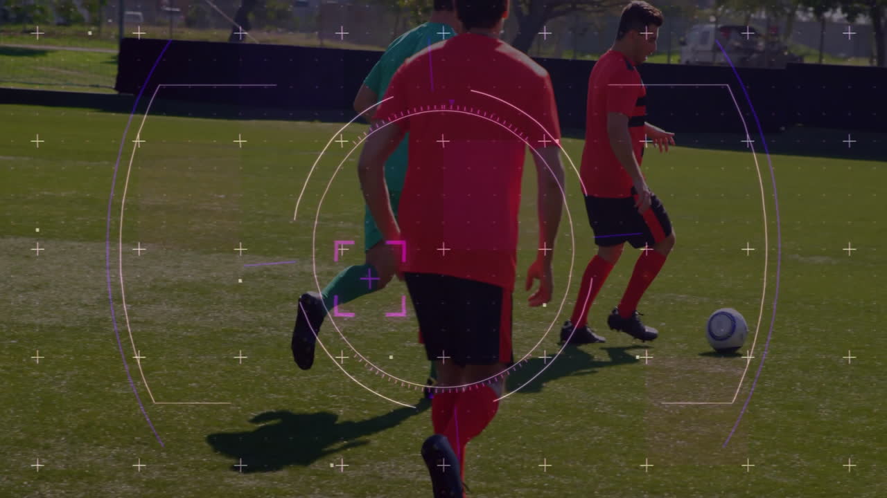 On field, soccer players practicing with digital targeting animation overlay