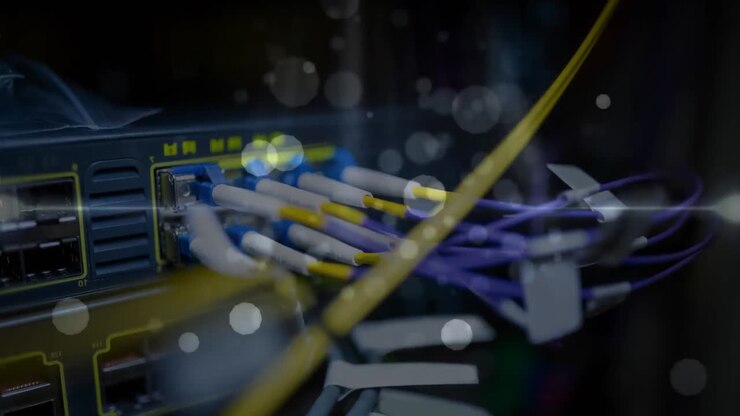 Animation of lights and dots floating over computer wires