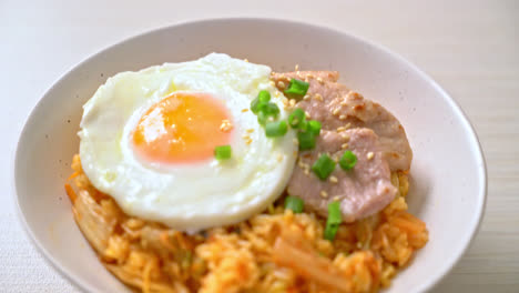 kimchi fried rice with fried egg and pork - korean food style
