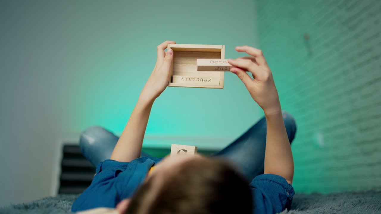 boy with wooden cube calendar. 4th of July American Independence day