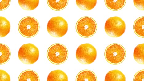 pattern made of cut and whole juicy orange fruits on white