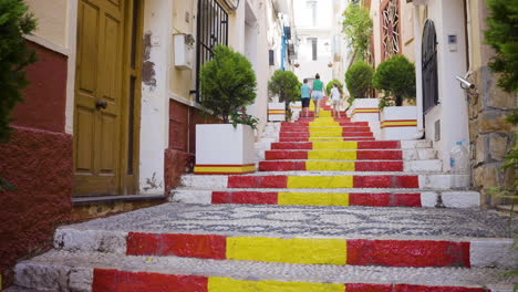 spanish alley stairs with people