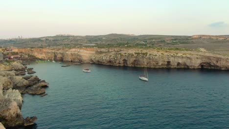 majestic aerial view of the cliffs surrounding the lagoon with old movie set