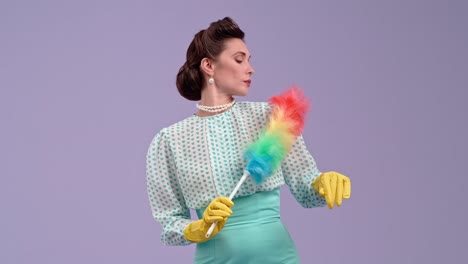 woman in retro outfit posing with a colorful feather duster