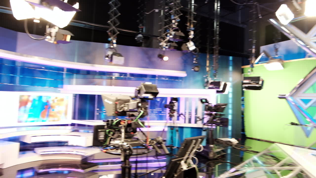 CHISINAU, MOLDOVA - 10 SEPTEMBER, 2019: Professional tv station set with screens and recording cameras and lights