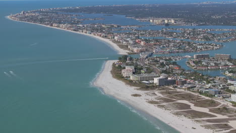 beautiful aerial drone beach vista with condos and neighborhoods in florida