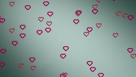animación de corazones que se mueven sobre un fondo gris