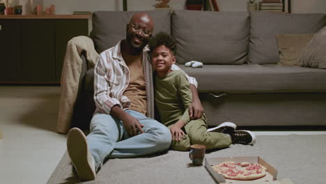 Black-man-and-boy-in-the-living-room